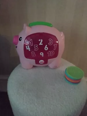 Buy Fisher-Price Laugh & Learn Counting Shaking Smart Stages Piggy Bank 10 Coins  • 16£