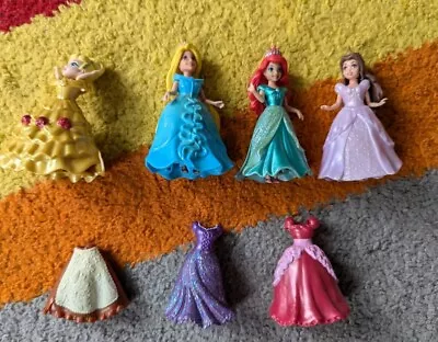 Buy Disney Princess Magic Clip Dolls - Ariel/Belle/Rapunzel/Cinderella + 7 Dresses  • 14.49£