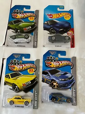 Buy Hot Wheels Lot X4 '‘70 Toyota Celica Green/Yellow & '95 Mazda RX-7 & Subaru C17 • 18.08£
