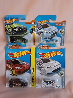 Buy Hotwheels X4 Ford Fiestas All In Mint And On Good Sealed Cards. • 29.99£
