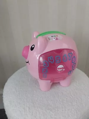 Buy Fisher-Price Learning Piggy Bank With Songs Music Speech Toy With 10 Coins  • 16£