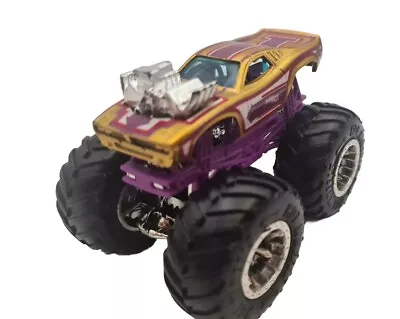 Buy Hot Wheels Rodger Monster Truck 1:64  Gold And Purple Diecast  • 7£