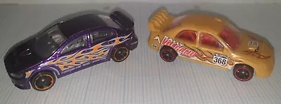 Buy Hot Wheels Subaru Vs Mitsubishi Evo 1:64  • 5.05£